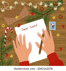 Writing a letter to Santa top view, flatley concept. Women's hands on the table with a pencil and a sheet of paper. An envelope, a stamp, a garland, spruce branches, a candy cane. Vector illustration.