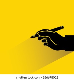 fondo amarillo escrito, bolígrafo de mano