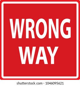 Wrong way caution traffic sign white letters on the red background