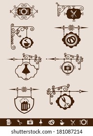 Wrought Iron Signage. Ancient street signboard for different places
