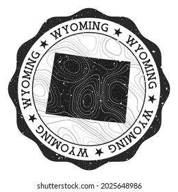 Wyoming outdoor stamp. Round sticker with map of us state with topographic isolines. Vector illustration. Can be used as insignia, logotype, label, sticker or badge of the Wyoming.