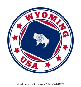 Wyoming state sign with flag and bison silhouette in a round vector illustration.