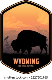 Wyoming vector label with buffalo bison and western meadowlark