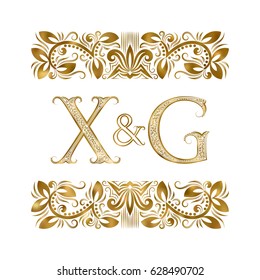 X and G vintage initials logo symbol. The letters are surrounded by ornamental elements. Wedding or business partners monogram in royal style.