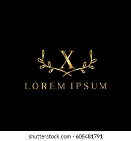 X letter golden branches vector logo design template