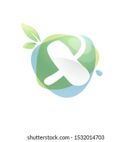 X letter logo with negative space at green watercolor splash background. Vector elements for organic food labels, ecology presentation, card etc.