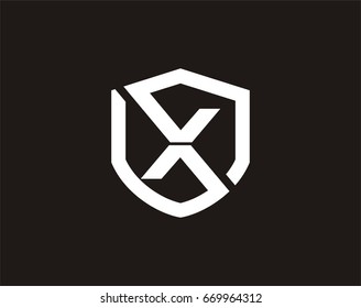 X letter in shield