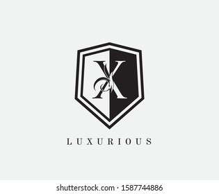 X Letter Shield Letter Logo Icon. Simple X Guard Logo design perfect for fashion, Jewelry, Beauty Salon, Cosmetics, Spa, Hotel and Restaurant Logo. 