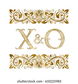 X and O initials vintage logo. The letters surrounded by ornamental elements. Wedding or business partners monogram in royal style.