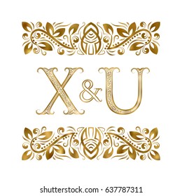 X and U initials vintage logo. The letters surrounded by ornamental elements. Wedding or business partners monogram in royal style.