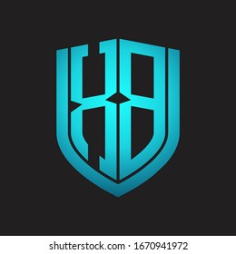 XB Logo monogram with emblem shield design isolated with blue colors on black background