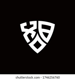 XB monogram logo with modern shield style design template isolated on black background