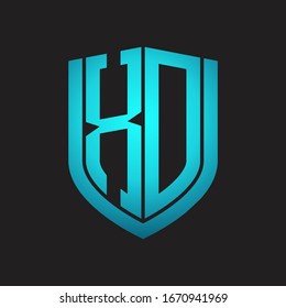 XD Logo monogram and emblem shield design isolated and blue colors black background