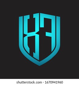 XF Logo monogram with emblem shield design isolated with blue colors on black background