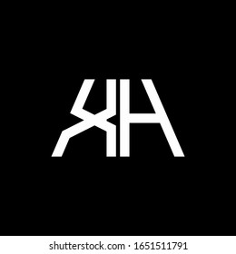 Logotipo XH monograma abstracto aislado en fondo negro