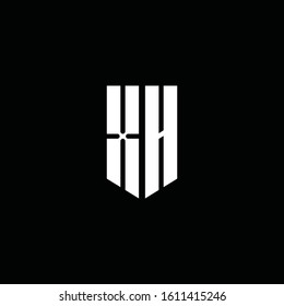 XH logo monogram with emblem style isolated on black background