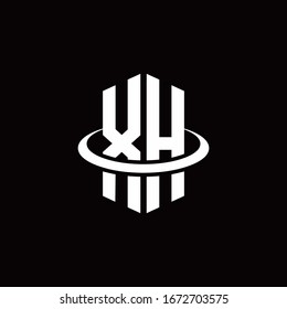 Logotipo XH en forma de hexágono y rodeado por un anillo