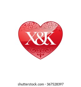 X&K initial letter logo with ornament heart shape
