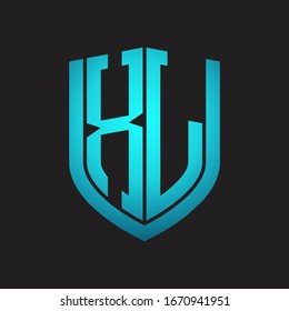 Monograma del logotipo XL con diseño de escudo de emblemas aislado con colores azules sobre fondo negro