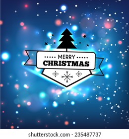 Xmas badge. Lights on blue background bokeh effect.