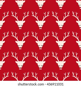 Xmas deer head silhouette seamless pattern. Cute deer with bow background for Christmas holidays. Xmas deer Illustration. Animal head texture. Design for textile, wallpaper, web, fabric, decor etc.