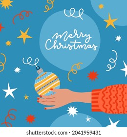 Xmas greeting card decorated with confetti, bauble in human hand. Female hand decorating or holding christmas tree decoration. Vector flat cartoon illustration