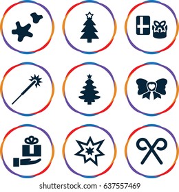 Xmas icons set. set of 9 xmas filled icons such as sparklers, christmas tree, bow, candy cane, fireworks, cookie, gift on hand
