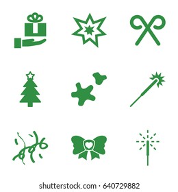 Xmas icons set. set of 9 xmas filled icons such as sparklers, christmas tree, bow, candy cane, sparkler, fireworks, cookie, confetti