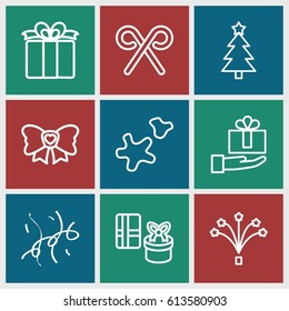 Xmas icons set. set of 9 xmas outline icons such as present, bow, candy cane, fireworks, cookie, confetti, Christmas tree, gift