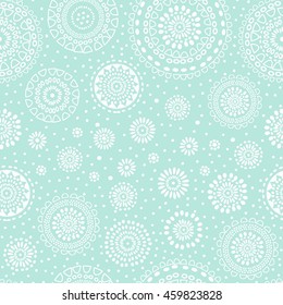 Xmas pattern with white snowflakes on light turquoise background. Vector abstract geometric seamless wallpapers.