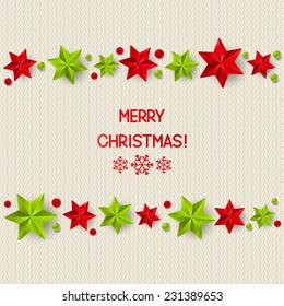 Xmas starry decorations on white knitted background