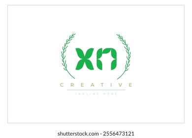 XN letters eco logo with leaf. Fresh nature and healthy leaf logo design.