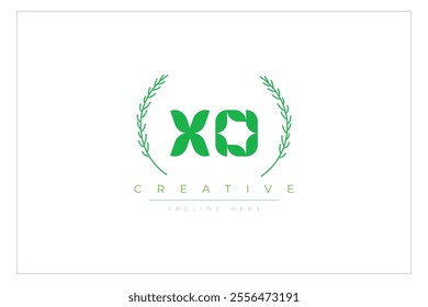 XO letters eco logo with leaf. Fresh nature and healthy leaf logo design.