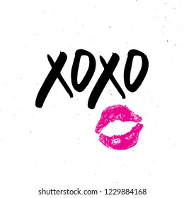 XOXO brush lettering sign, Grunge calligraphic hugs and kisses Phrase, Internet slang abbreviation XOXO symbols, vector illustration isolated on white background.