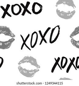 XOXO brush lettering signs seamless pattern, Grunge calligraphic hugs and kisses Phrase, Internet slang abbreviation XOXO symbols, vector illustration isolated on white background