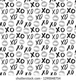 XOXO brush lettering signs seamless pattern, Grunge calligraphic hugs and kisses Phrase, Internet slang abbreviation XOXO symbols, vector illustration isolated on white background