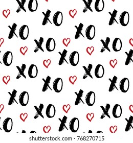 XOXO brush lettering signs seamless pattern, Grunge calligraphiv c hugs and kisses Phrase, Internet slang abbreviation XOXO symbols, vector illustration isolated on white background