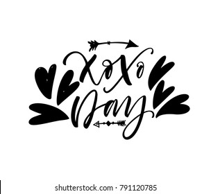 Xoxo day phrase. Lettering for Valentine's day. Ink illustration. Modern brush calligraphy. Isolated on white background.
