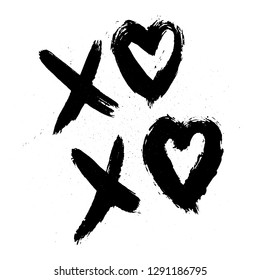 XOXO hand written phrase with hearts isolated on white background with ink spray. Hugs and kisses sign. Grunge brush lettering XO. Easy to edit template for Valentine’s day greeting card, poster, etc.