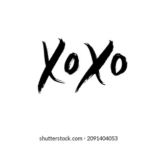XOXO hand written phrase isolated on white background. Hugs and kisses vector sign. Grunge black brush lettering XO. Greeting card template for Valentine’s day, wedding and birthday.