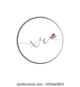 XR initial letter handwriting logo design with butterfly