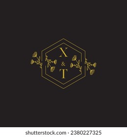 XT elegant wedding initial logo in high quality professional design that will print well across any print media