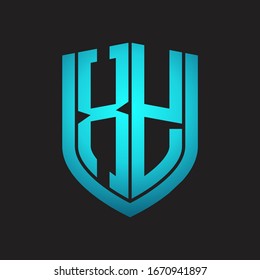 XY Logo monogram with emblem shield design isolated with blue colors on black background