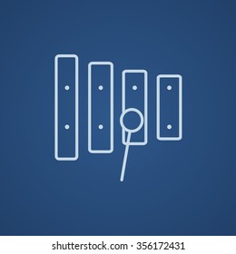 Xylophone with mallet line icon for web, mobile and infographics. Vector light blue icon isolated on blue background.