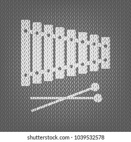 Xylophone sign. Vector. White knitted icon on gray knitted background. Isolated.