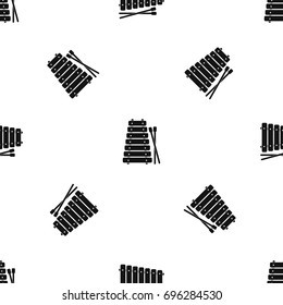 Xylophone and sticks pattern repeat seamless in black color for any design. Vector geometric illustration