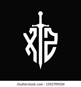 XZ logo with shield shape and sword design template	