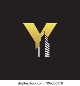 Fondo negro de color dorado de la letra mayúscula Y de la construcción del alfabeto
