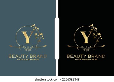 Y Beauty vector initial logo, Golden floral letters with flowers leaves and gold splatters isolated on white background. Vector illustration for wedding, greeting cards, invitations template design