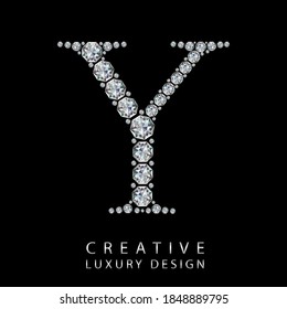 Y diamond letter vector illustration. White gem symbol logo for your luxury business, casino, jewelry or web site. Upper letter with many sparkling diamonds isolated on black background.